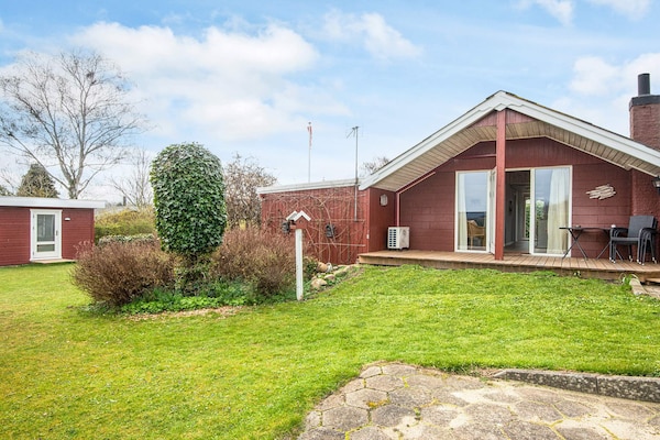 Foto van Vakantiehuis aan zee met privé-bijgebouw - Vakantiehuis in Juelsminde - Outdoor