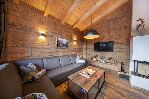 Foto van Alpenchalet met sauna en balkon - Vakantiehuis in Neukirchen - LivingRoom