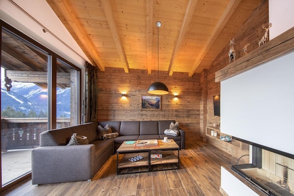 Foto van Alpenchalet met sauna en balkon - Vakantiehuis in Neukirchen - LivingRoom