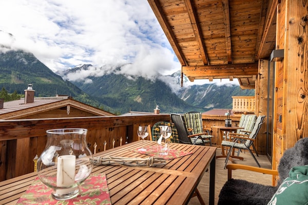 Foto van Alpenchalet met sauna en balkon - Vakantiehuis in Neukirchen - TerraceBalcony