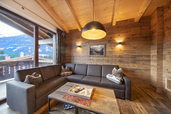 Foto van Alpenchalet met sauna en balkon - Vakantiehuis in Neukirchen - LivingRoom