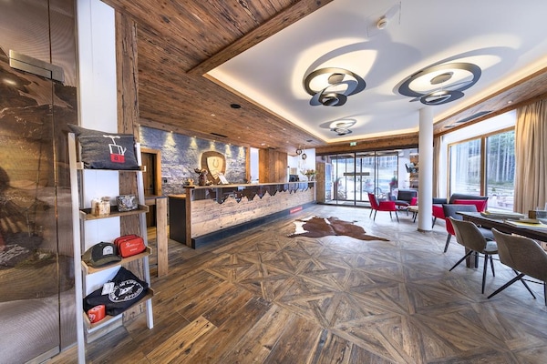 Foto van Alpenchalet met sauna en balkon - Vakantiehuis in Neukirchen - HallReception