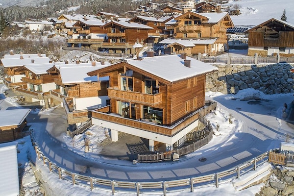 Foto van Chalet in Neukirchen bij Skilift & Sauna - Vakantiehuis in Neukirchen - ExteriorWinter