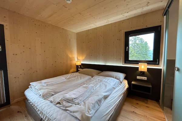 Foto van Charmant chalet met hottub op balkon - Vakantiehuis in Turrach - BedRoom