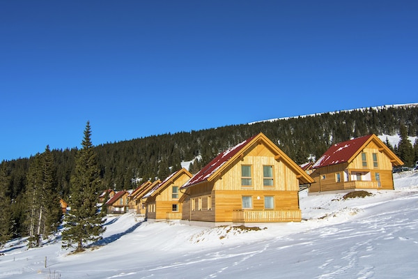 Foto van Chalet in Karinthië met sauna bij skipistes - Vakantiehuis in Sankt Gertraud-Weinebene - ExteriorWinter