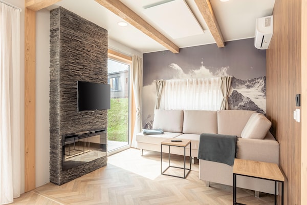 Foto van Luxe chalet met vaatwasser in de omgeving - Vakantiehuis in Kötschach-Mauthen - LivingRoom