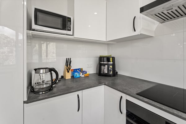 Foto van Familiehuis met 4 slaapkamers aan de kust van Hervey Bay, vlakbij het strand. - Kitchen