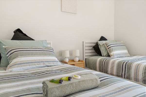 Foto van Familiehuis met 4 slaapkamers aan de kust van Hervey Bay, vlakbij het strand. - BedRoom