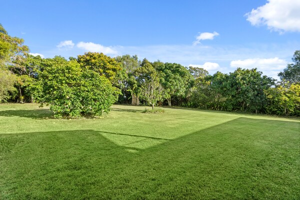 Foto van Familiehuis met 4 slaapkamers aan de kust van Hervey Bay, vlakbij het strand. - GardenSummer
