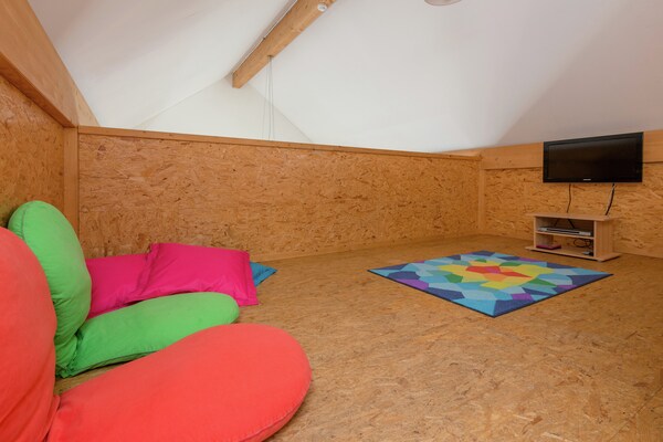 Foto van Comfortabel huis in de buurt van het bos met sauna - RecreationRoom