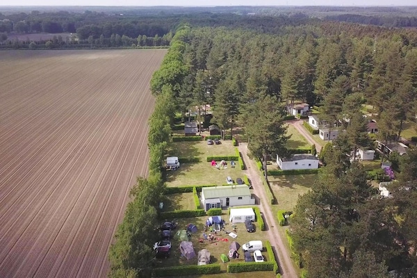 Foto van Cordelia Lodge met tuin en picknickplaats - Vakantiehuis in Ravels - AreaSummer5KM