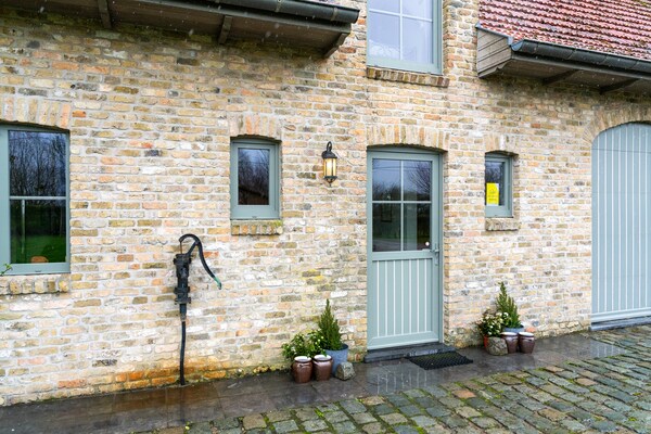 Foto van Comfortabele groepswoning met grote tuin - Vakantiehuis in Diksmuide - HallReception