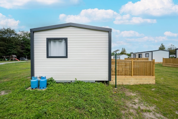 Foto van Comfortabele caravan in groene omgeving - Vakantiehuis in Lembeke (Kaprijke) - ExteriorSummer