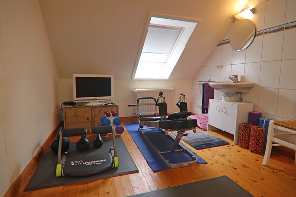 Foto van Romantische Ferienwohnung in Boldenshagen - Vakantiehuis in Kröpelin OT Boldenshagen - RecreationRoom