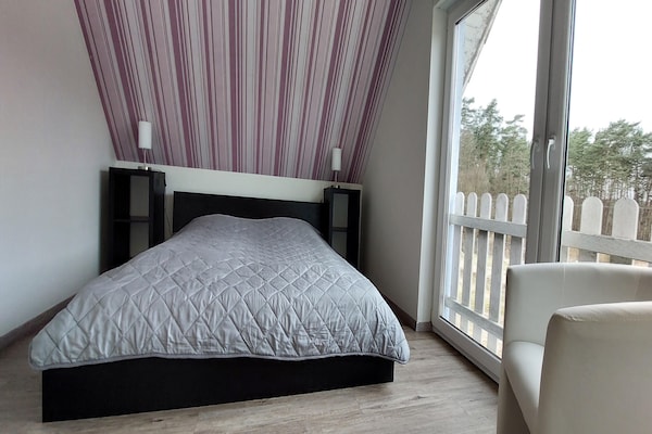 Foto van Vakantieappartement met uitzicht op het meer aan de Groß Labenzer See - BedRoom