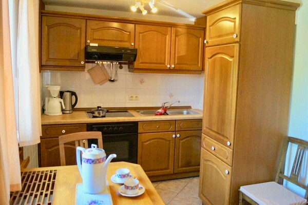 Foto van Charmant vakantiehuis met natuurlijke tuin - Vakantiehuis in Kaltennordheim-Unterweid - Kitchen