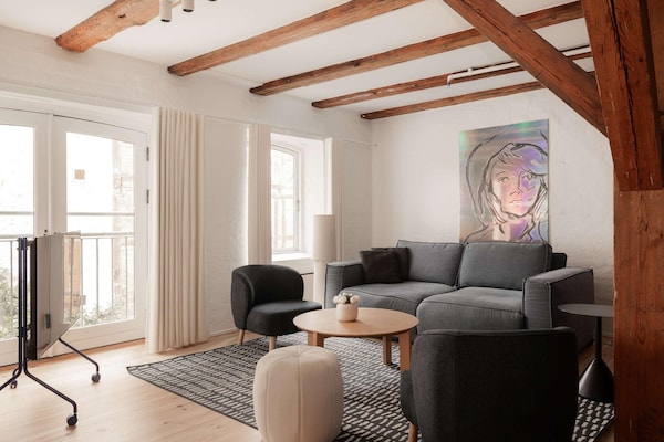 Foto van Deens huis in iconische binnenplaats van Nyhavn - Vakantiehuis in København - LivingRoom
