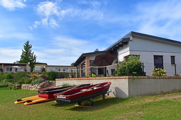 Foto van Vakantieappartement met eigen toegang tot het meer en een aanlegsteiger. - ExteriorSummer