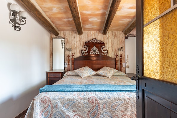 Foto van Villa in Santa Maria met zoutwaterzwembad - Vakantiehuis in Santa María Del Cami, Illes Balears - BedRoom