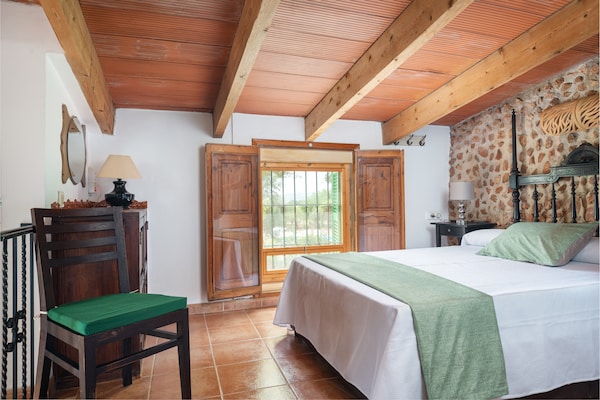 Foto van Villa in Santa Maria met zoutwaterzwembad - Vakantiehuis in Santa María Del Cami, Illes Balears - BedRoom