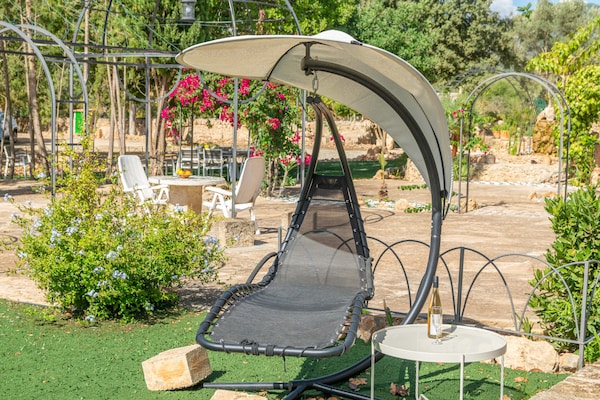 Foto van Villa in Santa Maria met zoutwaterzwembad - Vakantiehuis in Santa María Del Cami, Illes Balears - GardenSummer