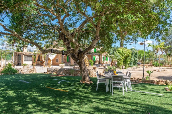 Foto van Villa in Santa Maria met zoutwaterzwembad - Vakantiehuis in Santa María Del Cami, Illes Balears - GardenSummer