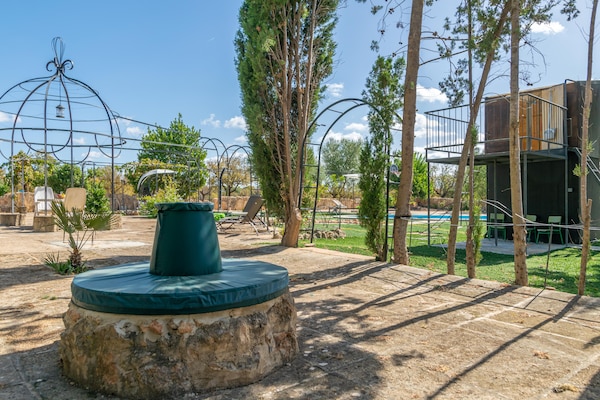 Foto van Villa in Santa Maria met zoutwaterzwembad - Vakantiehuis in Santa María Del Cami, Illes Balears - GardenSummer