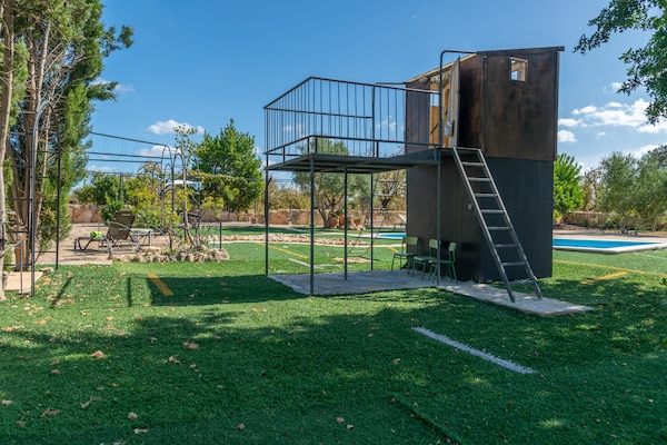 Foto van Villa in Santa Maria met zoutwaterzwembad - Vakantiehuis in Santa María Del Cami, Illes Balears - GardenSummer