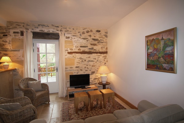 Foto van Charmant chalet met zwembad - Vakantiehuis in St.Medard D'excideuil - LivingRoom