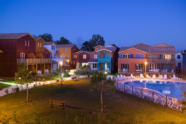 Foto van Hutretraite met gedeeld zwembad - Vakantiehuis in Le Teich - Ambiance