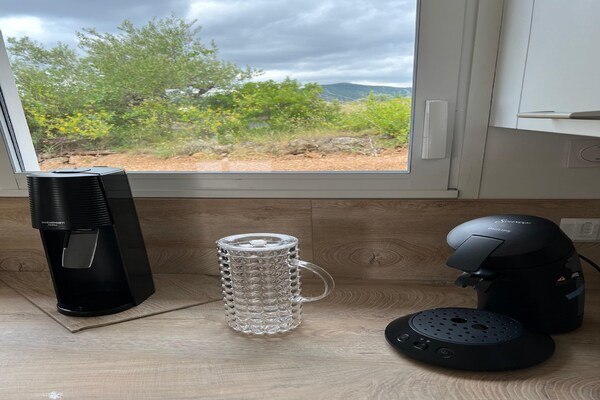 Foto van Villa l'Esquirol met uitzicht en zwembad - Vakantiehuis in Roquebrun - Kitchen