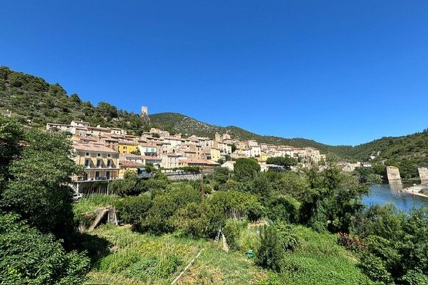 Foto van Villa l'Esquirol met uitzicht en zwembad - Vakantiehuis in Roquebrun - AreaSummer20KM