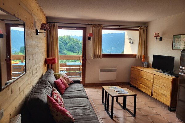 Foto van Appartement in Morillon met uitzicht op de bergen - Vakantiehuis in Morillon - LivingRoom
