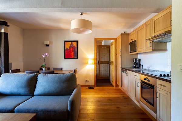 Foto van Ontspannend appartement aan het zwembad in de Alpen - LivingRoom