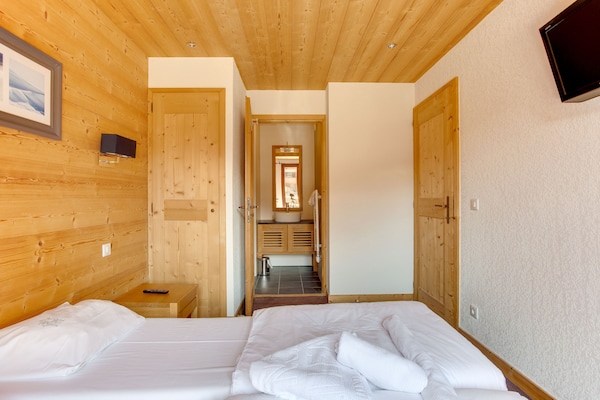 Foto van Ontspannend appartement aan het zwembad in de Alpen - BedRoom