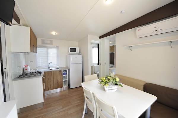 Foto van Stacaravan op vakantiepark Bella italia - Vakantiehuis in Peschiera - LivingRoom