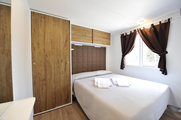 Foto van Stacaravan op vakantiepark Bella italia - Vakantiehuis in Peschiera - BedRoom