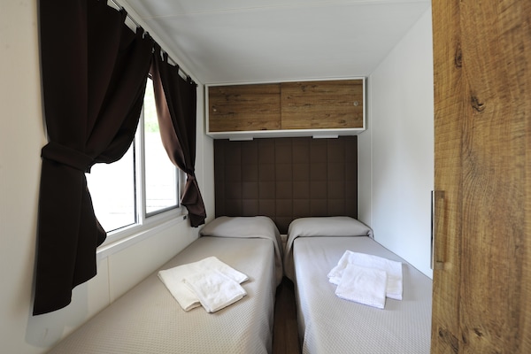 Foto van Stacaravan op vakantiepark Bella italia - Vakantiehuis in Peschiera - BedRoom