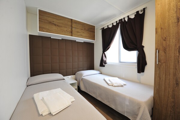 Foto van Stacaravan op vakantiepark Bella italia - Vakantiehuis in Peschiera - BedRoom