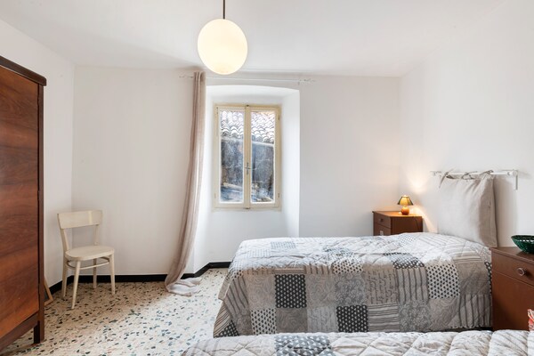 Foto van Comfortabel vakantiehuis in Predosa met tuin - Vakantiehuis in Predosa - BedRoom