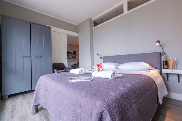 Foto van Appartement met uitzicht op het meer van Lugano. - Vakantiehuis in Porlezza - BedRoom