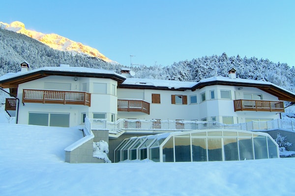 Foto van Appartement in villa met zwembad met zonnedak - Vakantiehuis in Stenico - ExteriorWinter