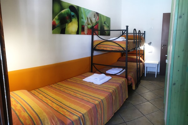 Foto van Resortappartement met zwembad - Vakantiehuis in Lido di Spina - BedRoom