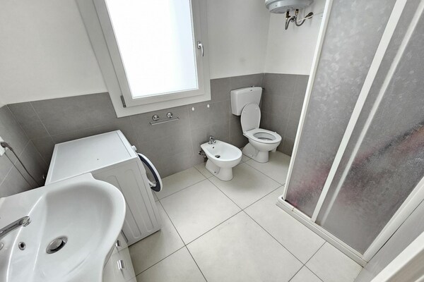Foto van Appartement in Rosolina Mare (RO) - Vakantiehuis in Rosolina Mare (RO) - BathRoom