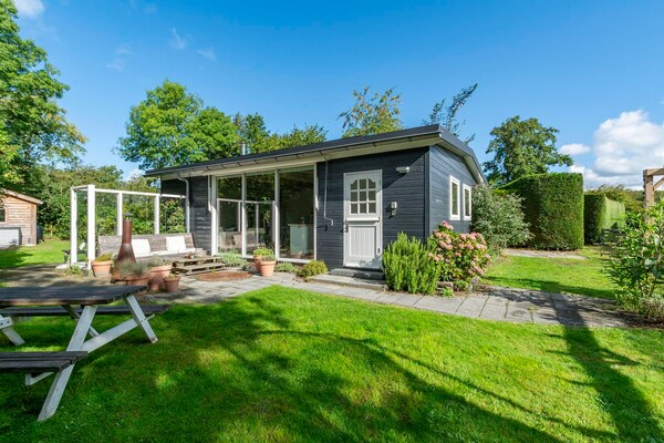 Foto van Eureka 109 Bungalow voor 6 personen met tuin - Vakantiehuis in Sint Maartensvlotbrug - ExteriorSummer