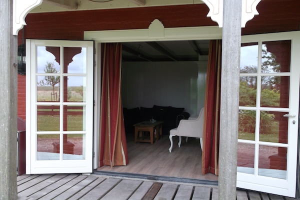 Foto van Comfortabele kustvakantie - Vakantiehuis in Hippolytushoef - TerraceBalcony