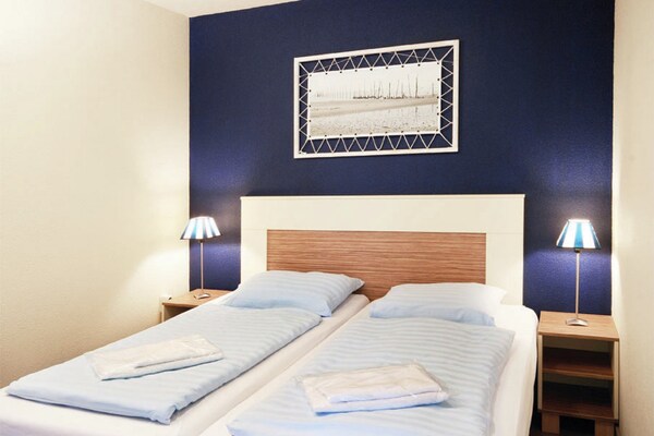 Foto van Vakantiehuis in Nederland met grote tuin - Vakantiehuis in De Cocksdorp Texel - BedRoom