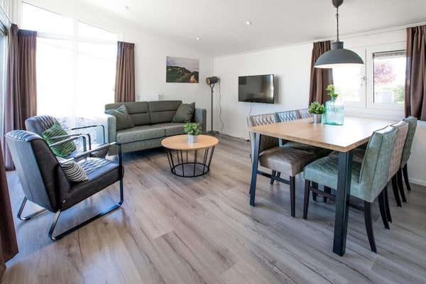 Foto van Familielodge Parc du Soleil met veranda - Vakantiehuis in Noordwijk - LivingRoom