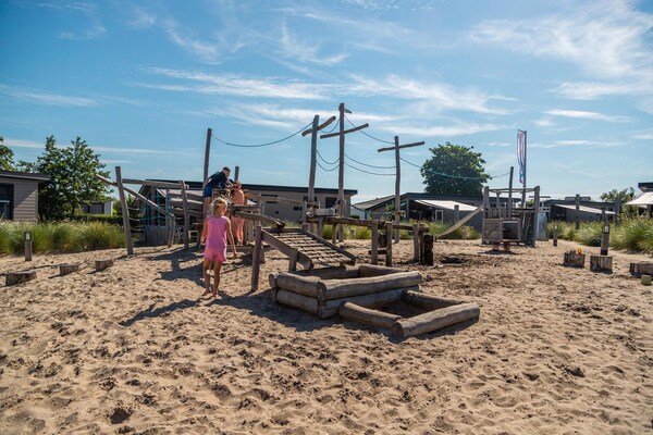 Foto van Familielodge Parc du Soleil met veranda - Vakantiehuis in Noordwijk - ParkFacilities