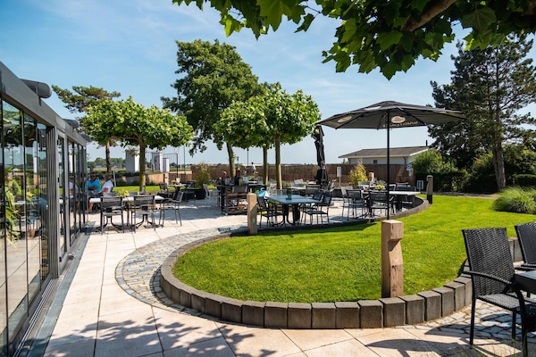 Foto van Familielodge Parc du Soleil met veranda - Vakantiehuis in Noordwijk - AreaSummer5KM